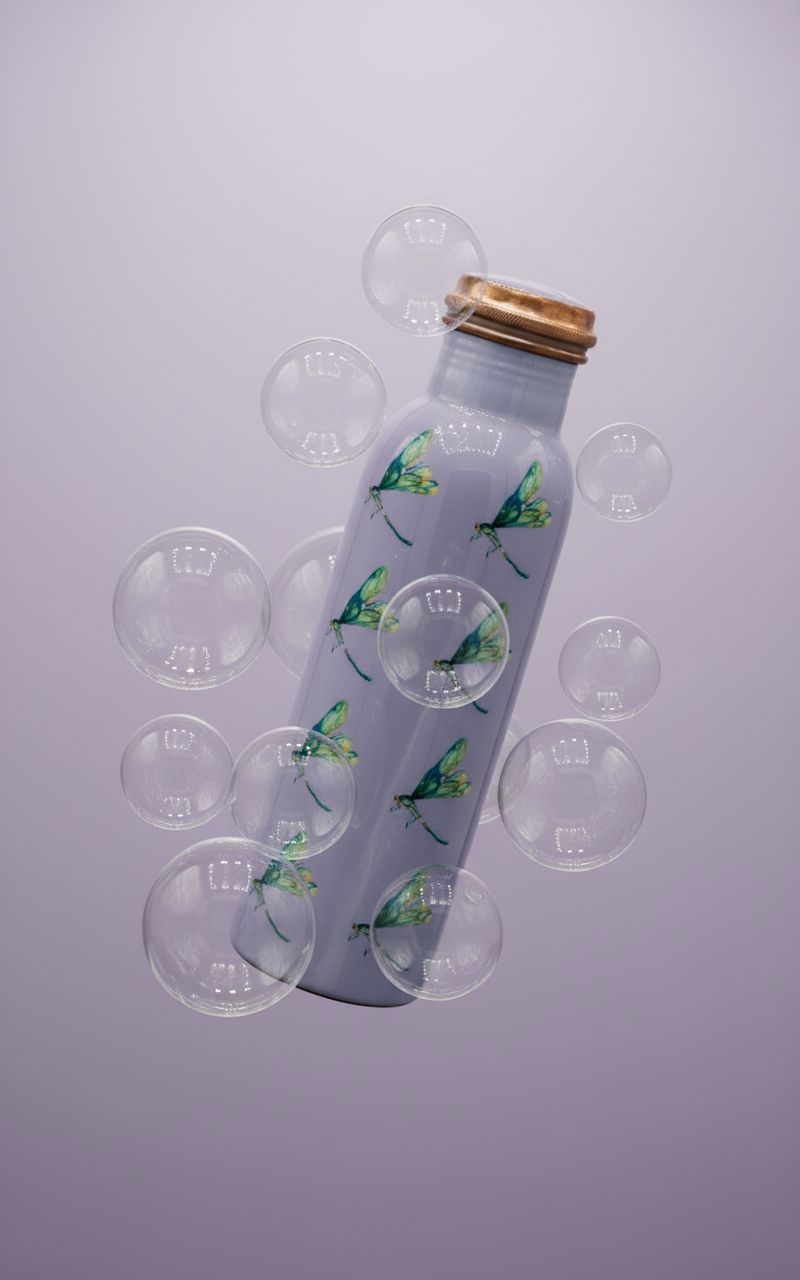 Handcrafted Lilac Copper Bottle with Dragonfly Motif